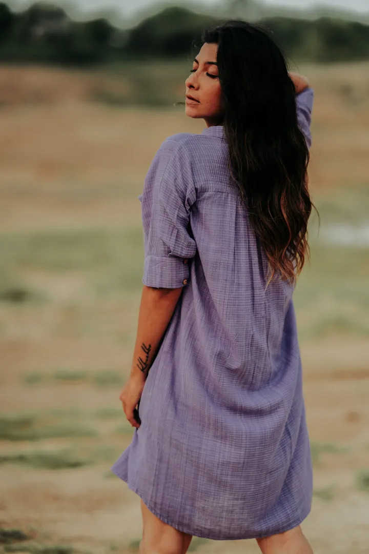 Button-Down Dress with pleats at the back.